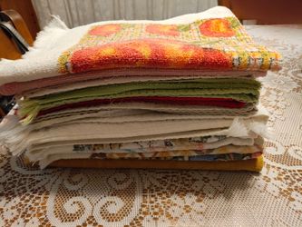 Stack (13) of kitchen/ hand towels freshly washed.