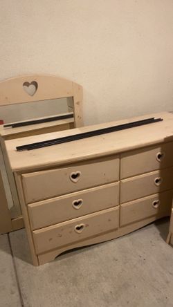 Little girls, dresser, and drawer with mirror