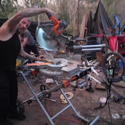 15 A 12" Ridgid Radial Arm Saw With Slide And Dolly Stand