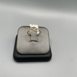 It’s a 10 KT REAL GOLD & MOISSANITE DIAMOND RING 