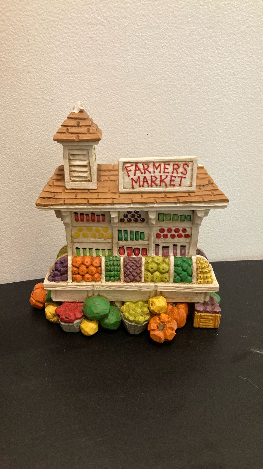 Farmers market art has two chipped areas