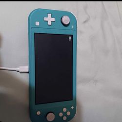 baby blue Nintendo switch light (Mario cart game included)