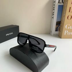 Prada Polarized Sunglasses - Unisex.
