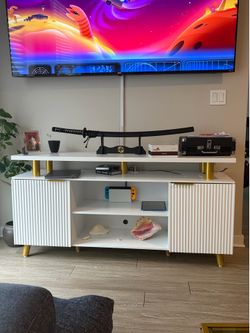 white and gold tv stand