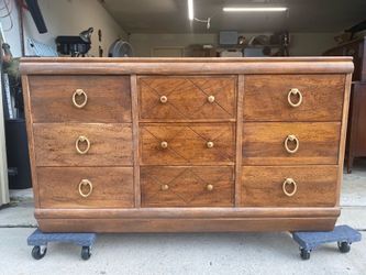 Solid wood9-drawer dresser, great condition, 325 or best offer.”