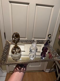 Vanity mirrored tray and perfume bottles