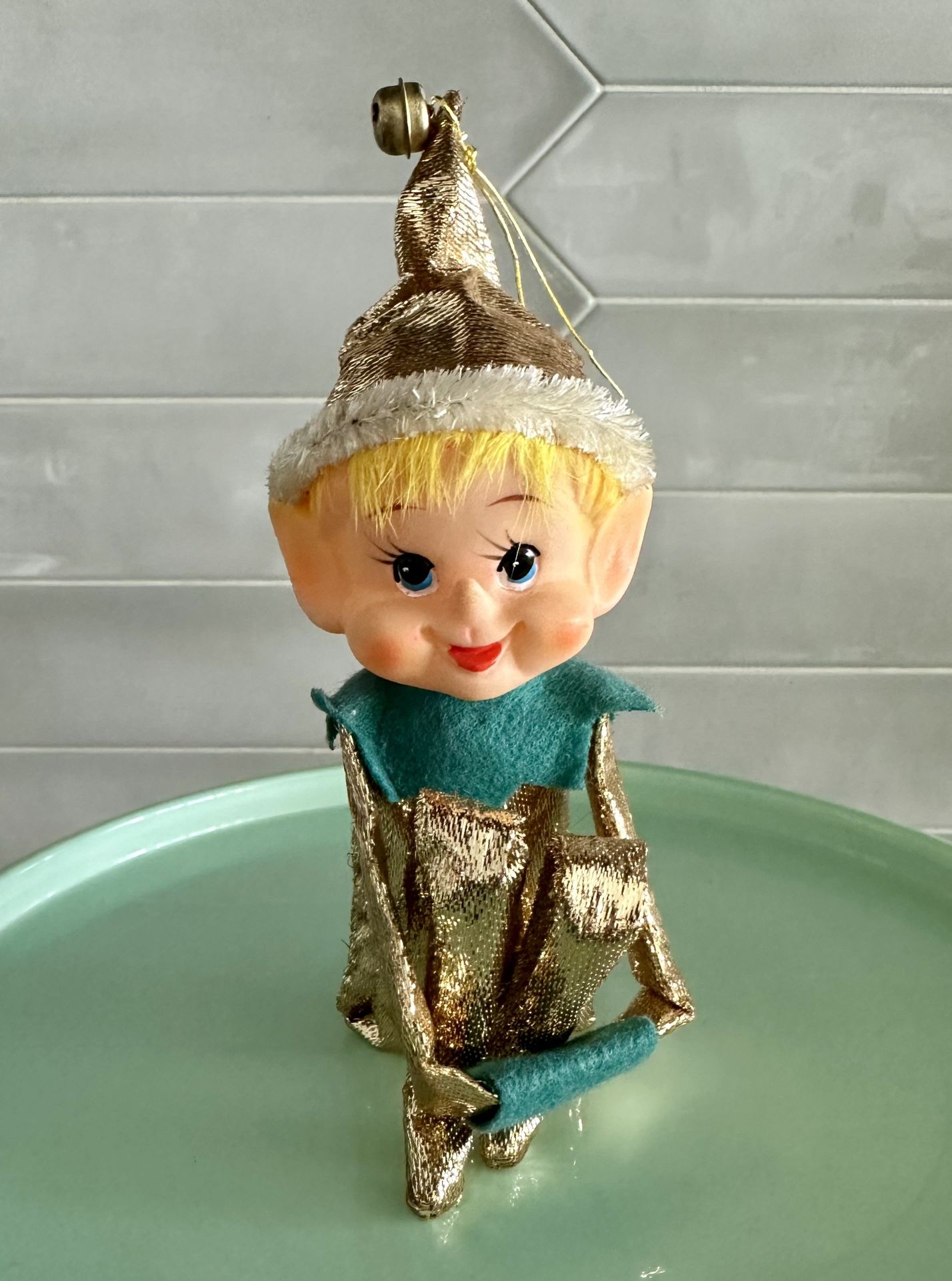 Vintage Japan metallic gold kneehugger Christmas elf.