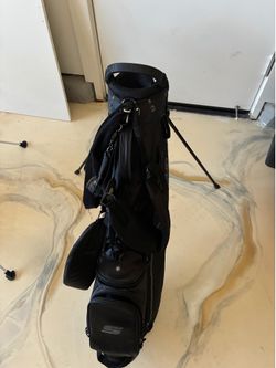 Golf bags and kids roller