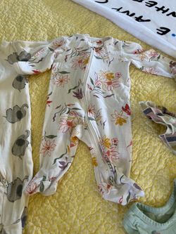 35 Baby items. Onesies, blankets, bibs, and MORE!