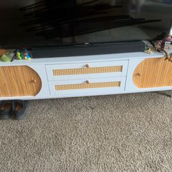 White And Wood TV Entertainment Stand Doors Slide Open And Two Cabinets 