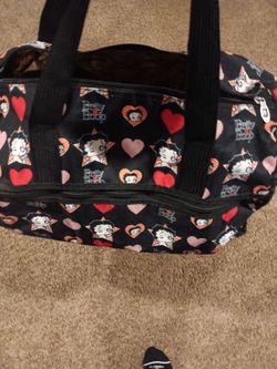 Like new Betty poop bag 10.00