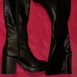 Black leather midway rise boots