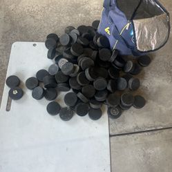 100+ Hockey Pucks 