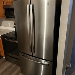 Gray double door fridge