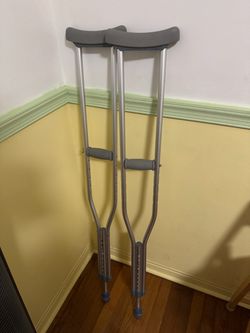 Adjustable crutches