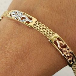 14k gold flower bracelet 7.25 Inches Long womans yellow white rose