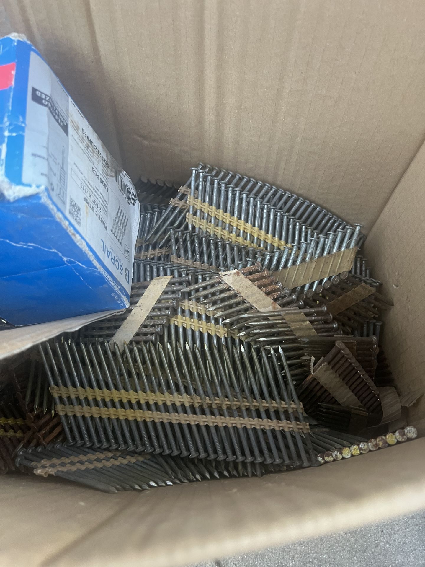 Box of Nails and Screws for Construction