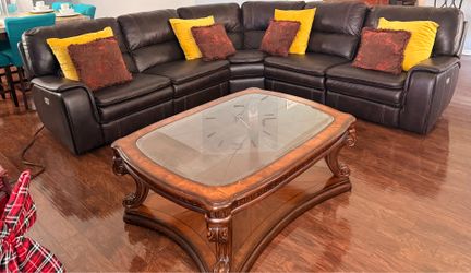 Leather large brown couch  with heavy duty wood glass Table