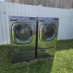 $475 LG gas dryer washer pedestal 27 inch wide, working great