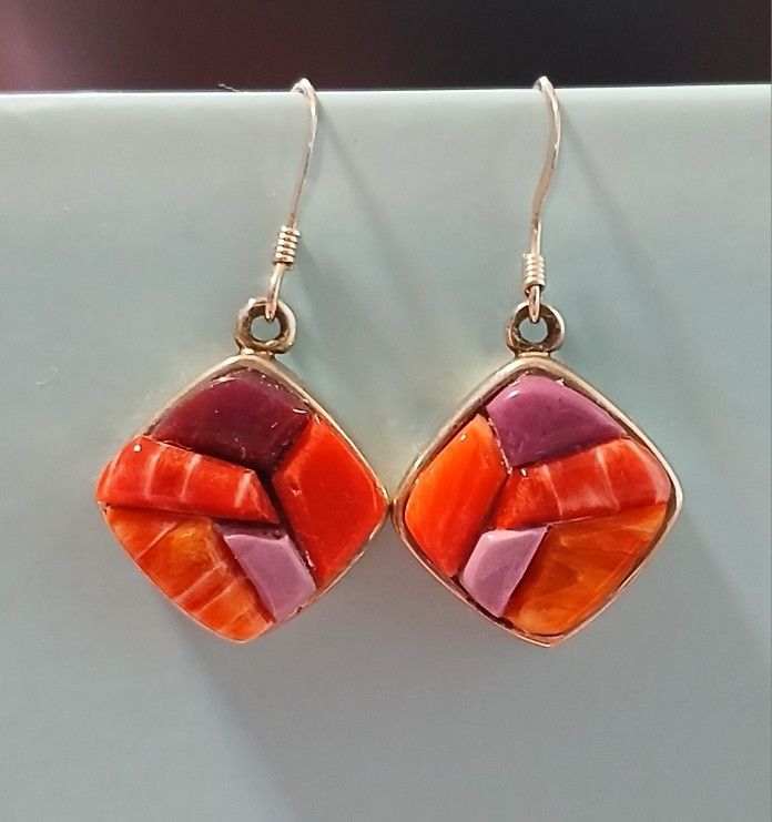 Zuni sterling silver dangle earrings, inlaid with multiple spiny shell oyster pieces to form a rose