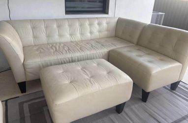 Leather sofa with chaise and ottoman. Price Including Delivery
