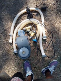 Pool water pump and a sweeper