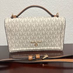 Authentic Michael Kors white signature phone wallet/crossbody