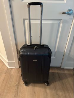 Blue Hardshell suitcase for sale