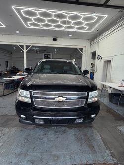 Black Chevrolet Suburban Full-Size SUV
