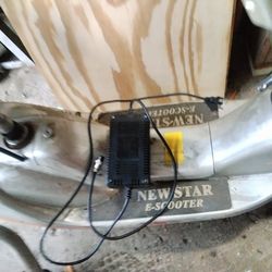Electric scooter needs key and new batteries have charger
