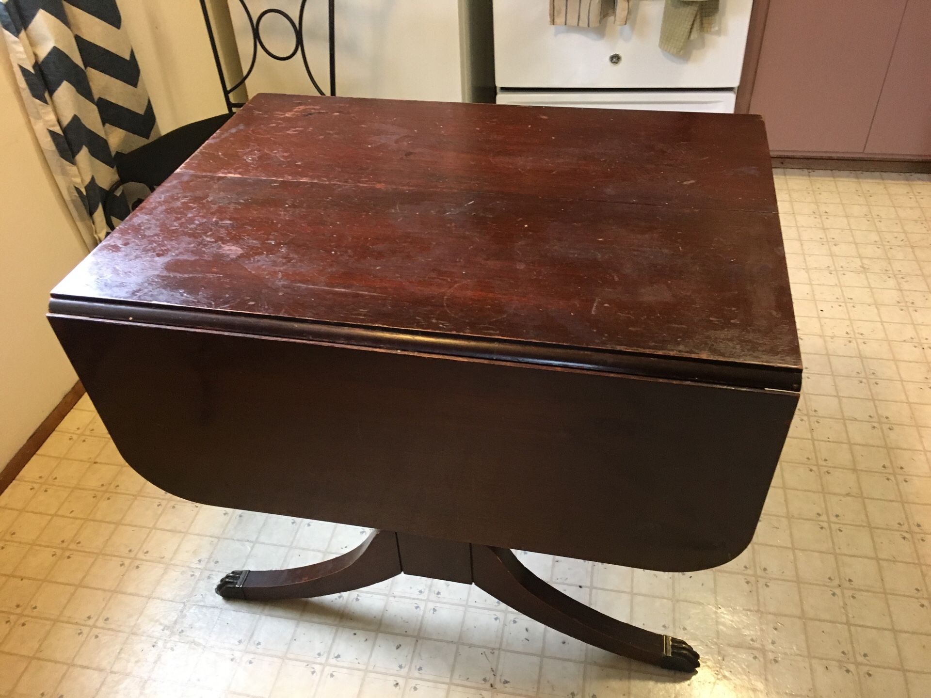 Sturdy kitchen table with fold down eaves