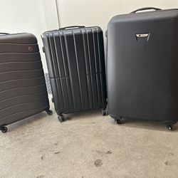 (3) XL suitcases.  PRICES VARY 