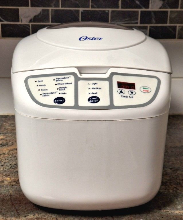OSTER 58-MINUTE EXPRESSBAKE BREAD MAKER