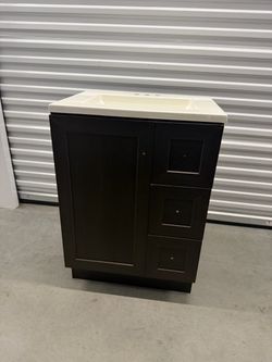 Brand new Glacier Bay Westminster 24 in. Vanity in Dusk with Cultured Marble Vanity Top in White with White Basin