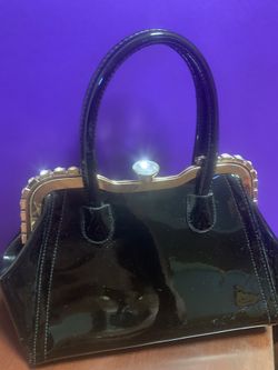 BRAND NEW RIMMEL SLEEK BLACK DIAMOND BEZZLED PURSE