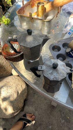 This is a vintage, octagonal aluminum stovetop espresso maker, commonly known as a Moka pot.