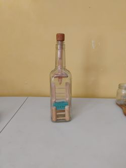 Bottle with a seat inside. Unique bottle. 