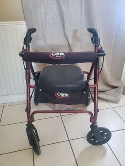 Rolling Walker with seat and storage area