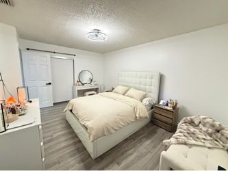 Queen mattress ,  box spring , and queenhead board 2 nightstands