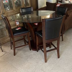 Brand new 36 inch high table and 424 inch stools brand new for only 799