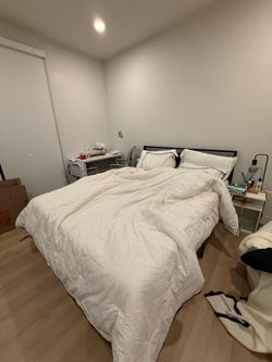 Black metal queen bed frame and mattress