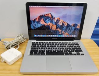 Excellent Condition Apple Macbook Pro running MacOS Sierra Intel i5 8GB Ram 64Gb Solid State Drive.