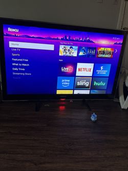 Samsung Flat Screen With Roku 60” Tv