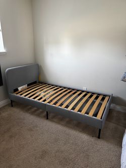 Gray Upholstered Twin Bed Frame with Slats