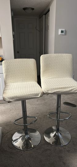 2 white Leather bar stools