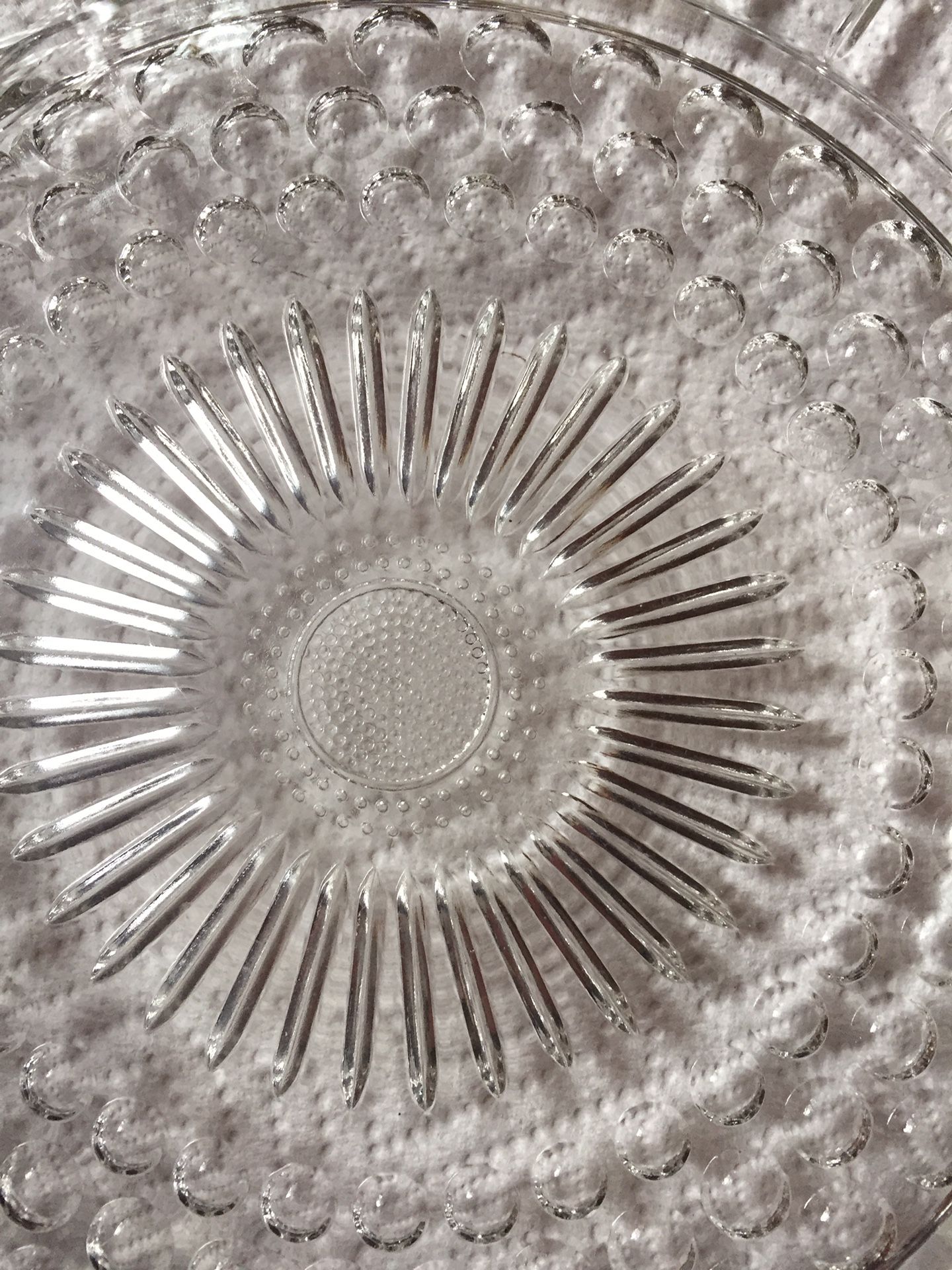 Sunflower clear round glass cake plate with little feet great condition