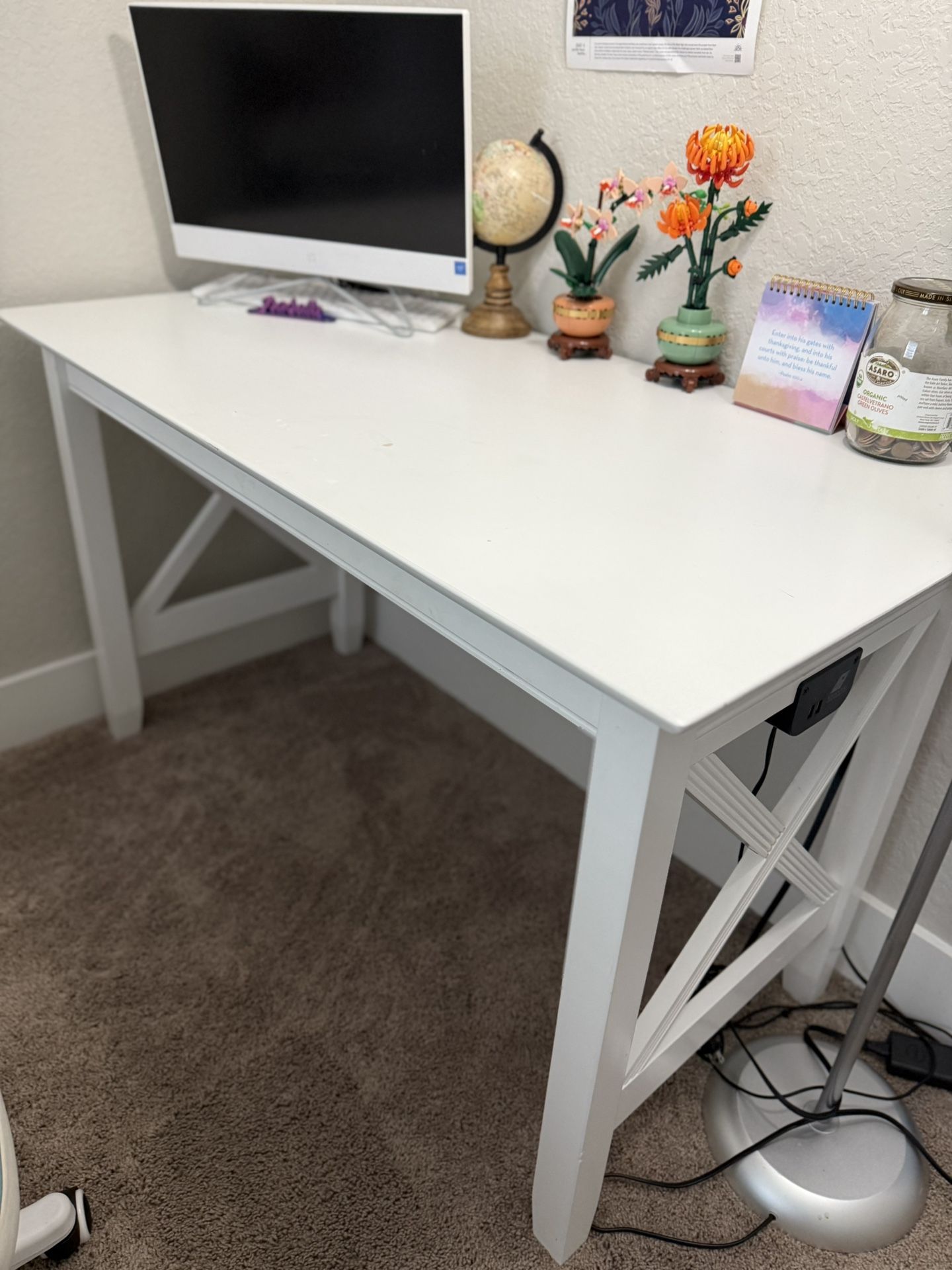 Desk with attachable USB Device Charger.