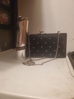 Swarovski Woman Parfum ..2.6 FL And Beautiful Black Bag