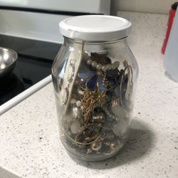 25 Pieces Jewelry Jar. Some New( Earrings Necklaces Bracelets)