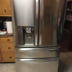 Lg Stainless Steel French Door stainless steel French door refrigerator with drawers. Only used two years immaculate no scratches or dents.